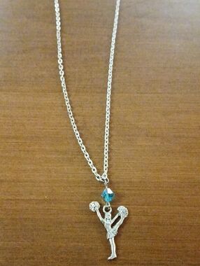 Silver Toned Cheerleader Pendant Necklace with Blue Crystal 1"